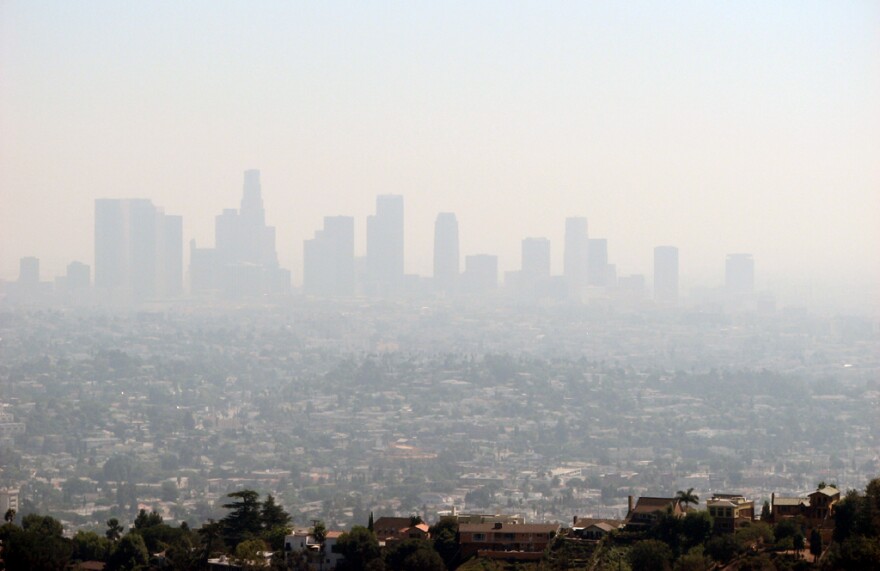 Smog blankets downtown Los Angeles. New low-cost air monitors allow people to know what air pollution is like not just in their city, but right outside their door.