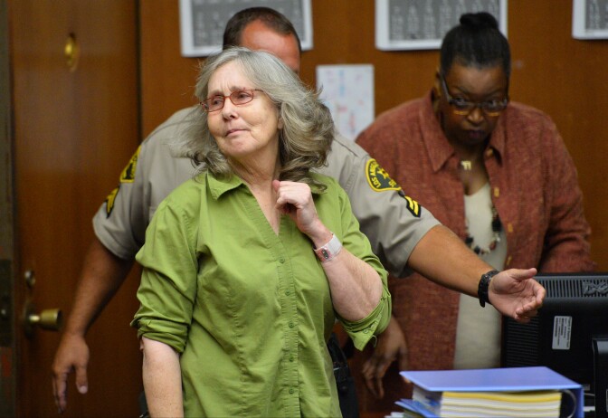 Susan Mellen looks at the judge as she enters the courtroom for her exoneration proceedings on Friday, Oct. 10, 2014 in Torrance.
