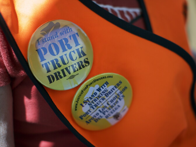 Members of Teamsters Local 848 picket at Pier J in the Port of Long Beach on Monday morning, April 27, 2015. Independent truckers for four companies have gone on strike, asking the four employers to reclassify them as permanent employees so that they can join the Teamsters union.