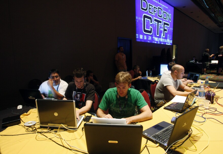 In this July 30, 2010 photo, Stephan Vanderbild of Germany participates in a capture the flag competition during the DefCon hacker conference in Las Vegas. 
