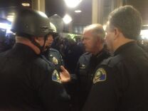 Anaheim police discuss a game plan for what's shaping up to be a long Tuesday night at City Hall.