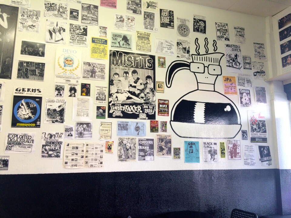 Flyers for old punk shows cover the walls in Rad Coffee.