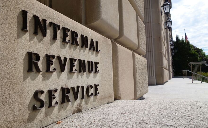 The Justice Department has entered settlements for two cases related to IRS scrutiny of groups seeking tax-exempt status.