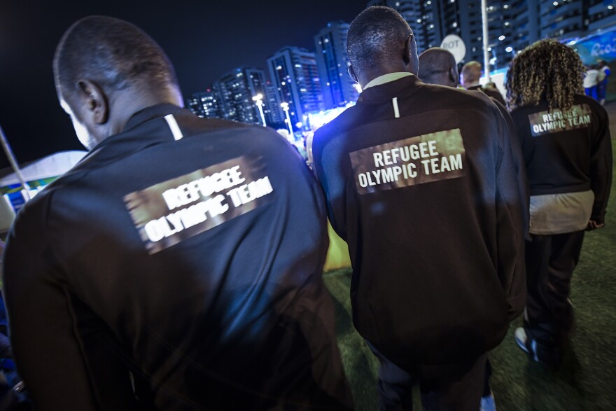 Refugee Olympic Team athletes for the Rio 2016 Olympic Games attend their welcome ceremony at the Athletes village on August 3, 2016 in Rio de Janeiro, Brazil.