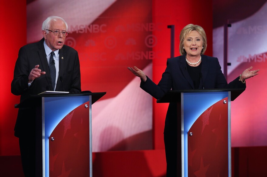 DURHAM, NH - FEBRUARY 04:  Democratic presidential candidates former Secretary of State Hillary Clinton and U.S. Sen. Bernie Sanders during their MSNBC Democratic Candidates Debate at the University of New Hampshire on February 4, 2016 in Durham, New Hampshire. This is the final debate for the Democratic candidates before the New Hampshire primaries.  (Photo by Justin Sullivan/Getty Images)
