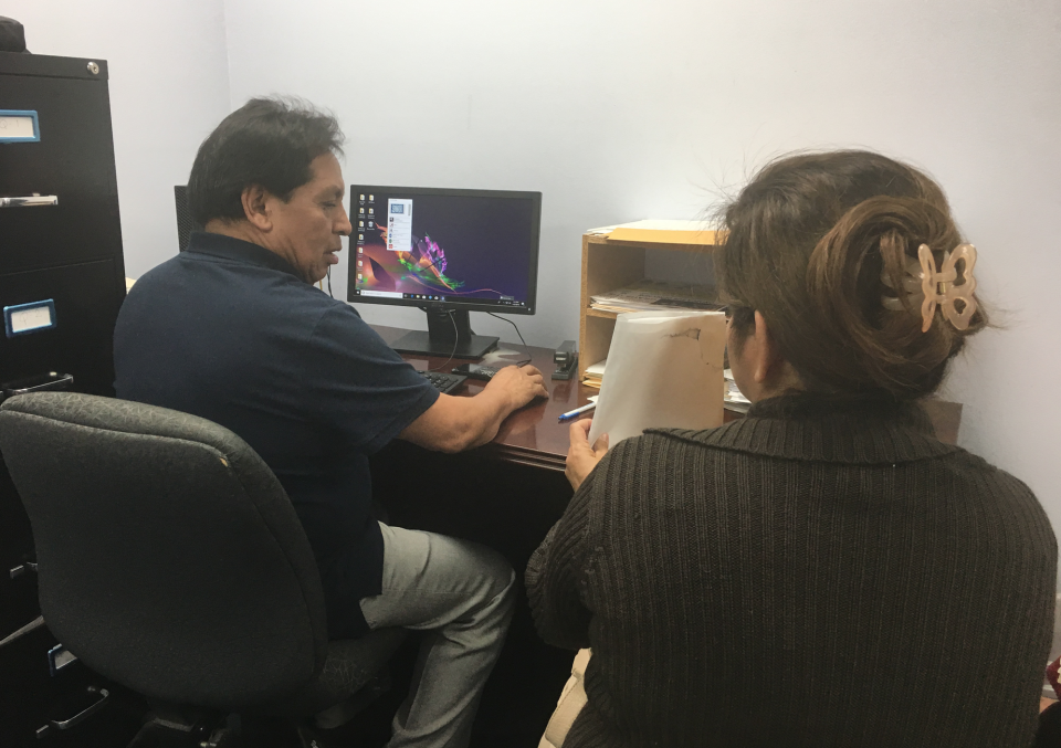 Dilcia Inestroza obtains help with her renewal application for Temporary Protected Status at El Rescate, a community organization and legal clinic just outside downtown Los Angeles. An immigrant from Honduras, she's had the protection for almost 20 years. The Trump administration has canceled TPS for immigrants from El Salvador, Haiti, Nicaragua and Sudan. Hondurans fear they could be next.