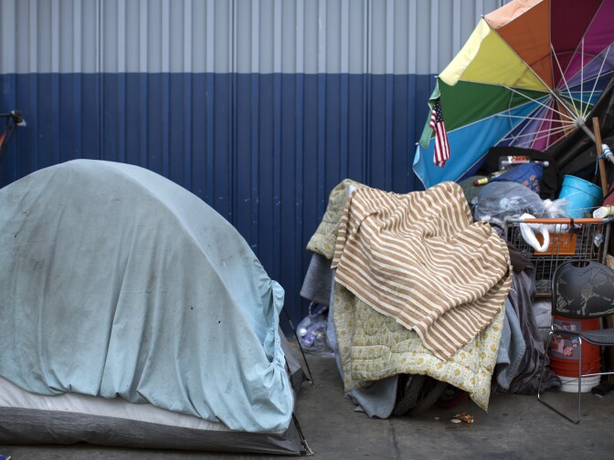 A tent stands on Gladys Avenue at East Fifth Street in Skid Row on Thursday morning, Dec. 17, 2015. 