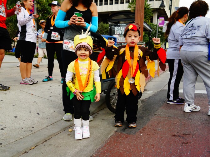 Sammy and Aiden Freyre of Alhambra, ages 3 and 5, dressed up as Thanksgiving fowl for the Turkey Trot L.A. Nov. 28, 2013 in Downtown Los Angeles.