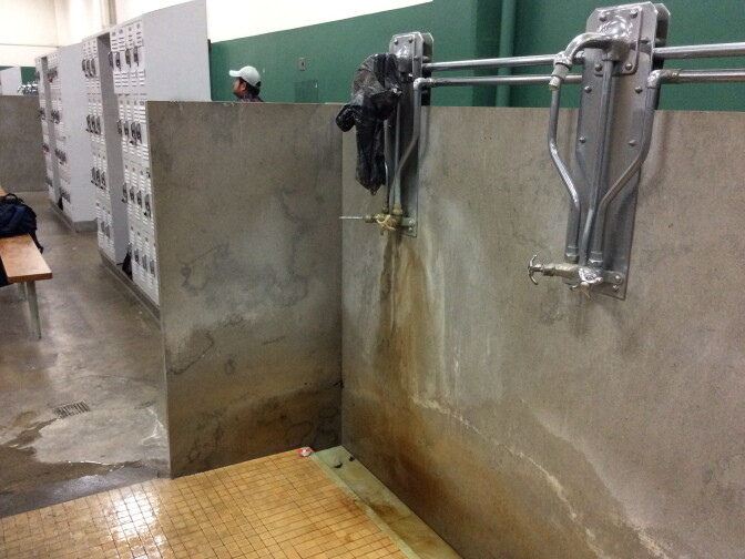 An inspector's photo shows a shower stuck in the on position in the girls' locker room at Inglewood High School.