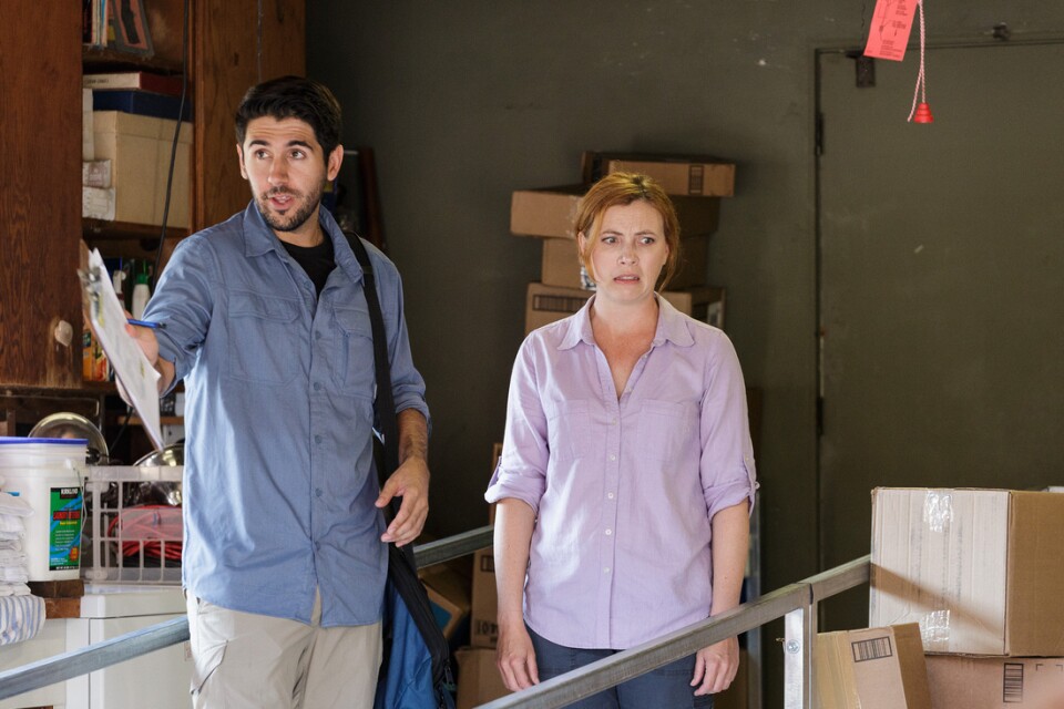 Actors Daniel Rubiano (left) and Amy Ellenberger (right) prepare for a disaster in a scene in Chalk Repertory Theater's site-specific play, "In Case of Emergency."