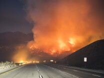 The Blue Cut Fire off Interstate 15 in the Cajon Pass Tuesday evening. 



The Blue Cut Fire burns in San Bernardino County Tuesday evening August 16th, 2016. The fire had burned 15,000 acres and was 0% contained, with multiple structures threatened and destroyed. Interstate 15 was also shut down at the 215. 