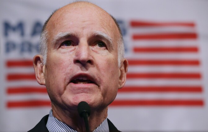 California Gov. Jerry Brown addresses a conference commemorating the 10th anniversary of the Center for American Progress in the Astor Ballroom of the St. Regis Hotel October 24, 2013 in Washington, DC. 
