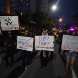 Anti-Trump protesters demonstrate outside the convention center where Republican presidential candidate Donald Trump held an election rally in San Jose, California on June 2, 2016. 
