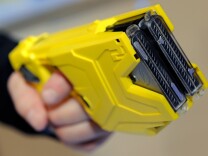 File: Taser International's X2 two-shot Taser for law enforcement is displayed at the National Shooting Sports Foundation's 34th annual Shooting, Hunting, Outdoor Trade Show at the Sands Expo and Convention Center in January 2012 in Las Vegas, Nevada.