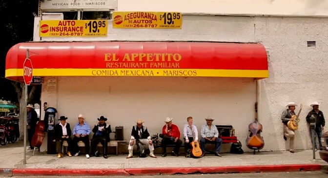 A scene from "Mateo," the new documentary. Can you spot mariachi Mateo Stoneman, the subject of the film, as he waits for a gig in East LA?