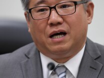 Kenneth Bae delivers remarks during an event to promote his book "Not Forgotten" on Capitol Hill. 