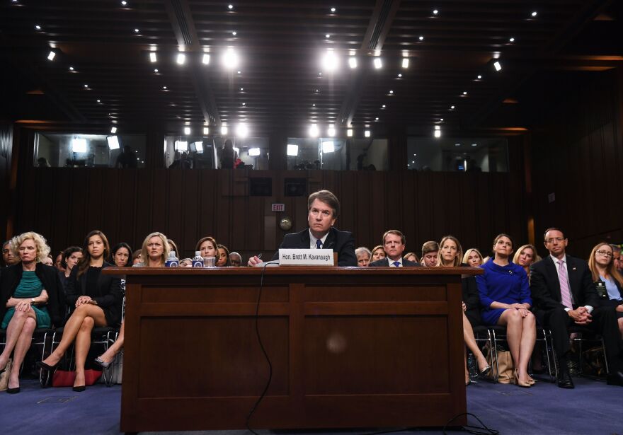 US Supreme Court nominee Brett Kavanaugh listens during the first day of his confirmation hearing in front of the US Senate on Capitol Hill in Washington DC, on September 4, 2018. - President Donald Trump's newest Supreme Court nominee Brett Kavanaugh is expected to face punishing questioning from Democrats this week over his endorsement of presidential immunity and his opposition to abortion. Some two dozen witnesses are lined up to argue for and against confirming Kavanaugh, who could swing the nine-member high court decidedly in conservatives' favor for years to come. Democrats have mobilized heavily to prevent his approval. (Photo by SAUL LOEB / AFP)        (Photo credit should read SAUL LOEB/AFP/Getty Images)