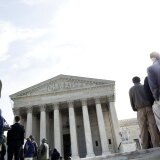File: People wait to enter outside the U.S. Supreme Court March 21, 2011 in Washington, D.C.