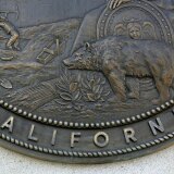 SAN FRANCISCO - JANUARY 22:  A section of the California seal hangs on the front of the State of California Earl Warren building January 22, 2007 in San Francisco, California. The U.S. Supreme court threw out California's sentencing law on Monday, a decision that could reduce sentences for thousands of inmates in the California State correctional facilities.  (Photo by Justin Sullivan/Getty Images)