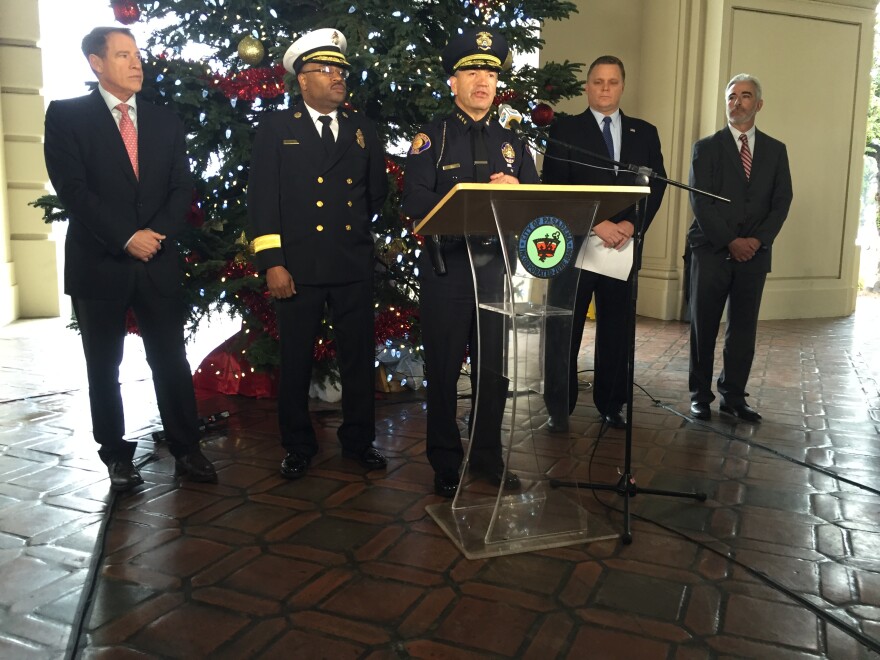 Pasadena Police Chief Phillip Sanchez speaks with reporters at City Hall about security preparations for the Rose Parade and Rose Bowl. He is joined by Fire Chief Bertral Washington (L) and U.S. Department of Homeland Security Special Agent-In-Charge Mark Selby.