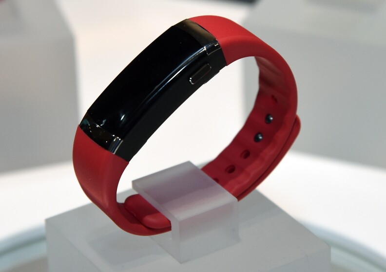 LAS VEGAS, NV - JANUARY 04:  InBody displays the first wearable fitness tracker and body composition analyzer during a press event at the Mandalay Bay Convention Center for the 2015 International CES on January 4, 2015 in Las Vegas, Nevada. In addition to sleep tracking and heart rate measurements, the unit measures body fat percentage, total muscle mass, body fat mass and basal metabolic rate (BMR). CES, the world's largest annual consumer technology trade show, runs from January 6-9 and is expected to feature 3,600 exhibitors showing off their latest products and services to about 150,000 attendees.  (Photo by Ethan Miller/Getty Images)