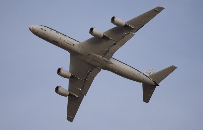 The under belly of a plan is visible while airborne.