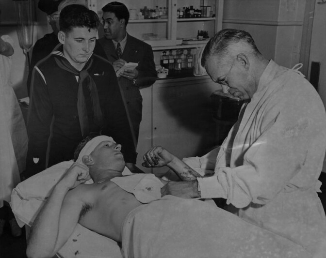Donald Jackson, a 20-year-old sailor, who was slashed in the abdomen in a riot between servicemen and zoot-suiters on Thurday, June 3, 1943, is shown being treated in the hospital. 