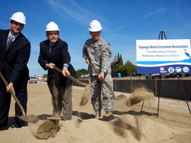 Mark Pesrella from LA County Public Works, Supervisor Zev Yaroslavsky, and Colonel Mark Toy break ceremonial ground on the Tujunga Wash Restoration Project.