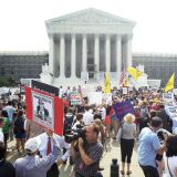 Obamacare supporters and protesters gather in front of the U.S. Supreme Court to find out the ruling on the Affordable Health Act June 28, 2012 in front of the U.S. Supreme Court in Washington, DC. The Supreme Court has upheld the whole healthcare law of the Obama Administration.