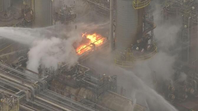 A fire burns at the Torrance Refining Co. refinery on Tuesday, Nov. 15, 2016.