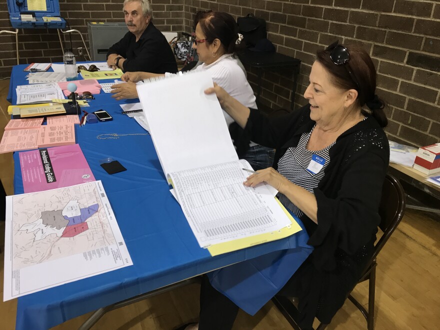 Poll workers staff a voting location in North Hollywood during the Los Angeles city election on May 16, 2017. 