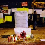 A memorial is set up following the fatal shooting of Manuel Jaminez as officers from the Los Angeles Police Department patrol following clashes with protestors, on Sept. 7, 2010 in Los Angeles.