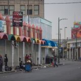 LOS ANGELES, CA - JUNE 01: Homeless people mill around on a Skid Row sidewalk after packing up their tents for the day and before businesses open on May 1, 2017 in Los Angeles, California. The newly released 2017 Greater Los Angeles Homeless Count indicates a 20 percent jump in the city of Los Angeles while Los Angeles County has spiked 23 percent. Voters have approved a record number of funds for homeless services with the passage of Measure HHH in the city and Measure H countywide.  (Photo by David McNew/Getty Images)