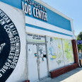 A storefront with a sign that says, "Pasadena Job Center."