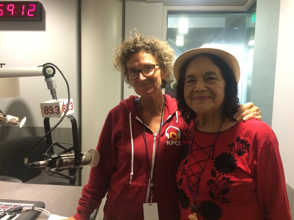 Labor activist Dolores Huerta in the KPCC studio with "Morning Edition" host Alex Cohen.