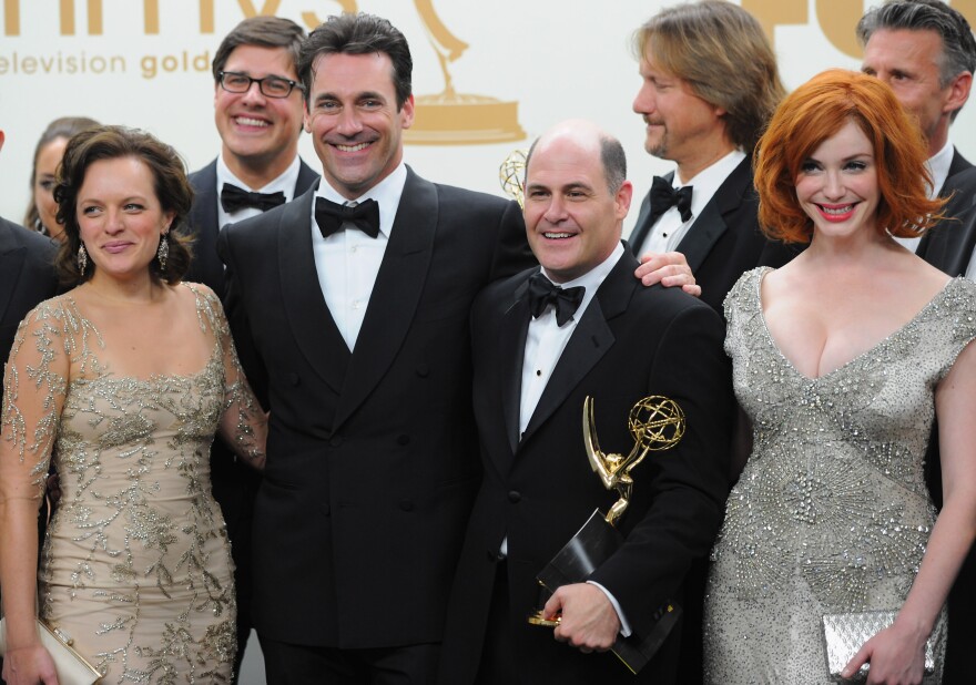LOS ANGELES, CA - SEPTEMBER 18:  The cast and crew of 'Mad Men' including Elisabeth Moss, Jon Hamm, Matthew Weiner and Christina Hendricks  poses in the press room during the 63rd Annual Primetime Emmy Awards held at Nokia Theatre L.A. LIVE on September 18, 2011 in Los Angeles, California on September 18, 2011 in Los Angeles, California.  (Photo by Alberto E. Rodriguez/Getty Images)