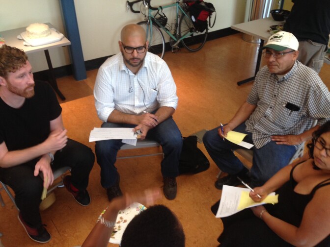 Tenants gather into committee groups that will address areas such as protests, policy and media outreach.