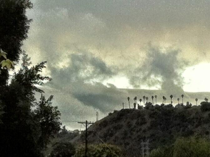 The weather service issued flood warnings as the storm headed west through Los Angeles and the San Gabriel Valley