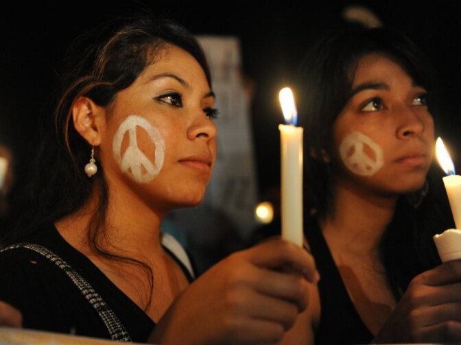 University students take part in a wake against violence held in Tegucigalpa, Honduras, in October. According to the United Nations, Honduras is the most violent country in the world.