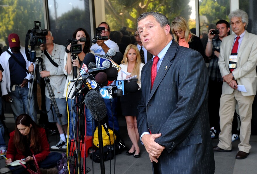 Former LA County Sherriff spokesman Steve Whitmore speaks to media in front of Beverly Hills Courthouse during Lindsay Lohan probation revocation hearing on July 6, 2010, just one of hundreds of times the former journalist addressed his former media colleagues. 