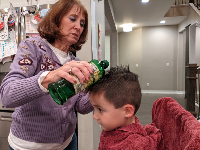 LiceDoctors technician Linda Holmes checks the heads of everyone in the Marker family for lice, including preschooler Hudson. It cost more than $200 to get the four-person household checked — eyebrows and Dad's beard included.