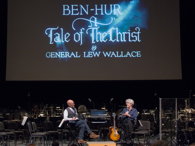 Frame host John Horn talks with Police drummer Stewart Copeland before his live score performance of "Ben Hur."