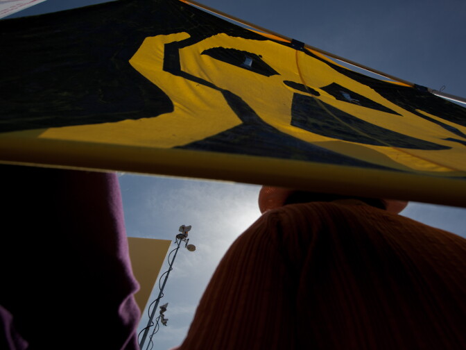 A satellite antenna from a television news van reaches toward the sky at a anti-nuclear protest near the San Onofre plant on  April 6, 2012.