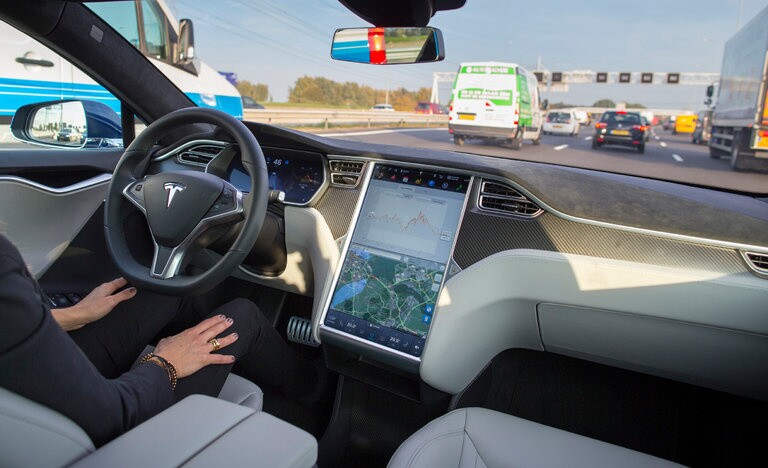 Interior of a Tesla A Tesla Model S, with its self-driving mode enabled. 