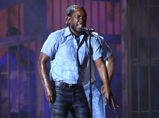 Kendrick Lamar performs at the 58th annual Grammy Awards on Monday, Feb. 15, 2016, in Los Angeles. (Photo by Matt Sayles/Invision/AP)