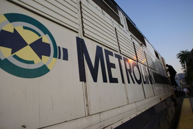 File: A conductor steps down from the engine of a Metrolink train on Sept. 15, 2008 in Chatsworth.