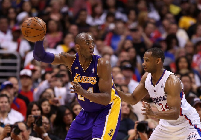Kobe Bryant #24 of the Los Angeles Lakers handles the ball during the NBA game against the Los Angeles Clippers at Staples Center on April 7, 2013 in Los Angeles, California.  The Clippers defeated the Lakers 109-95. 