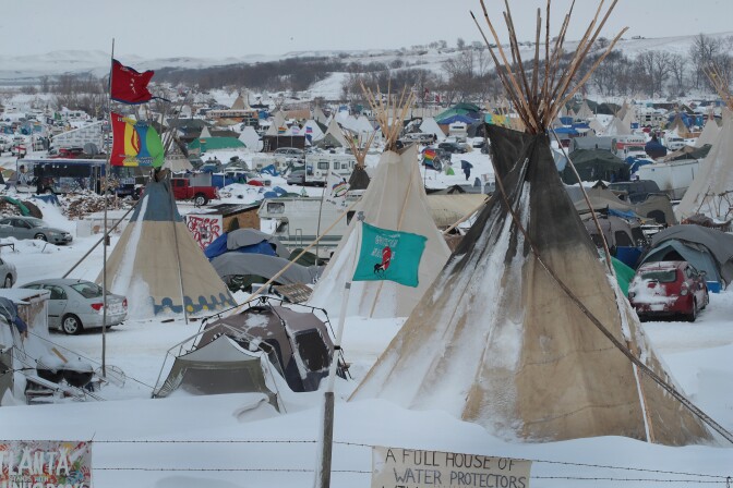 CANNON BALL, ND - NOVEMBER 30:  Snow covers Oceti Sakowin Camp near the Standing Rock Sioux Reservation on November 30, 2016 outside Cannon Ball, North Dakota. Native Americans and activists from around the country have been gathering at the camp for several months trying to halt the construction of the  Dakota Access Pipeline. The proposed 1,172 mile long pipeline would transport oil from the North Dakota Bakken region through South Dakota, Iowa and into Illinois.  (Photo by Scott Olson/Getty Images)