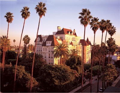 Another view of the Church of Scientology International with palm trees