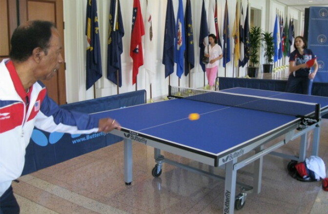 Judy Hoarfrost and George Braithwaite, original members of the 1971 "ping pong diplomacy team," warm up Friday at the Nixon Library in Yorba Linda.
